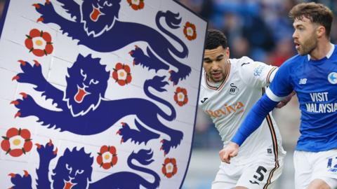 FA badge crest alongside Ben Cabango of Swansea City and Calum Chambers of Cardiff City