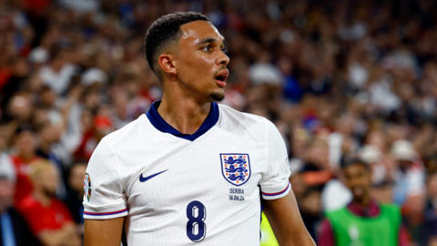 Trent Alexander-Arnold reacts while playing for England
