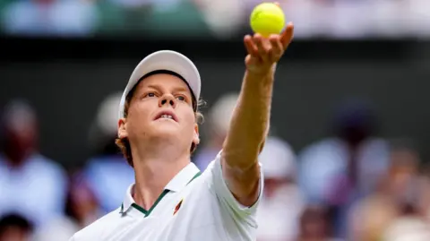 Cameron Norrie hits a forehand