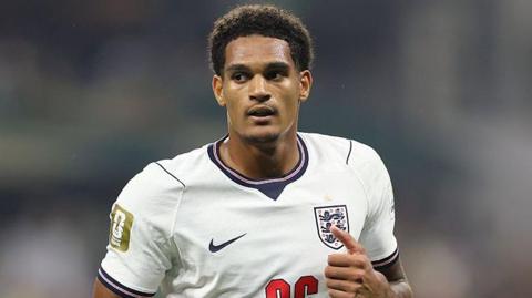 Jarell Quansah in action for England