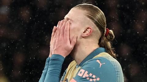 Erling Haaland reacts as Manchester City lose to Paris St-Germain