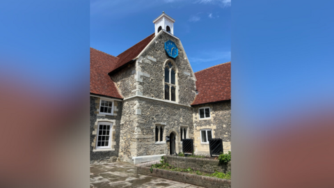 An external image of the Poor Priests' Hospital in Canterbury
