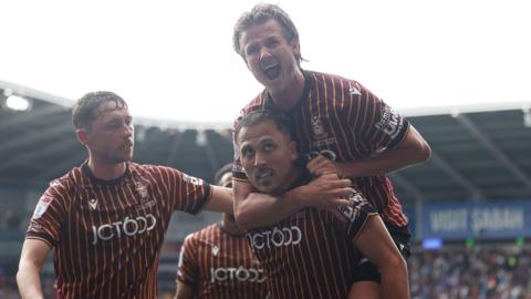 Antoni Sarcevic of Bradford City celebrates scoring a goal with fellow goal scorer Tommy Leigh who is on the back of Sarevic