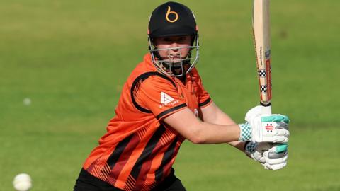 Kathryn Bryce batting for The Blaze against Lancashire as she steers a shot into the offside