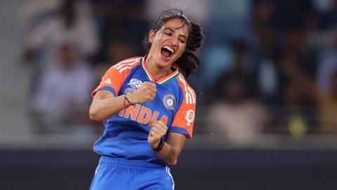 India bowler Renuka Singh celebrates taking a wicket