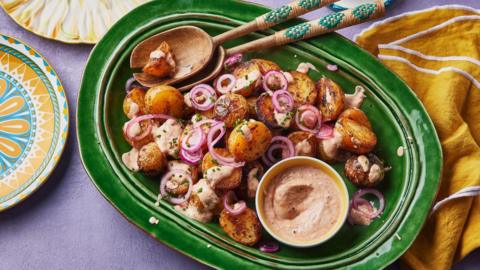Crispy piri-piri potatoes with spiced yoghurt dressing