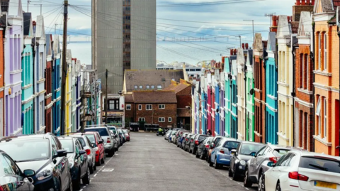 Cars parked on a side street in Brighton.