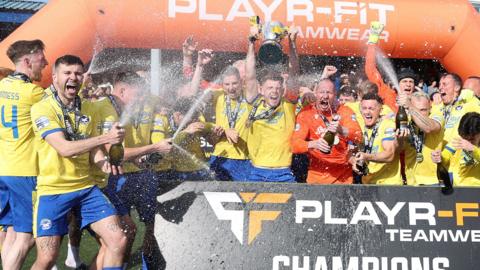 Bangor celebrate winning the Championship