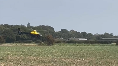 Index image of helicopter chasing biker