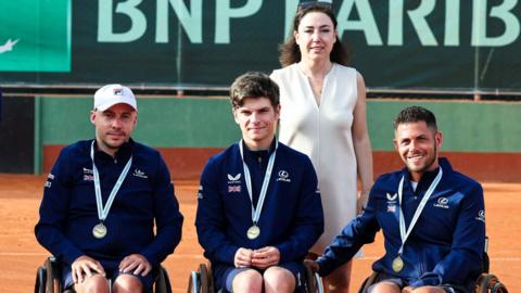 British wheelchair tennis players Andy Lapthorne (left), Greg Slade (centre) and Gary Cox (right) with their bronze medals from the World Team Cup