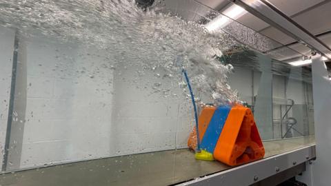 A demonstration of the bubble barrier ramp in a tank at the University of Derby
