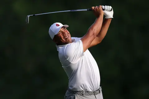 Jhonattan Vegas hitting a shot