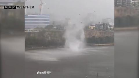 Waterspout spins across Brisbane River