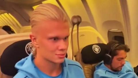 Manchester City footballer Erling Haaland on board a plane