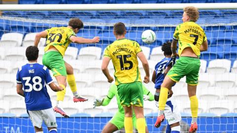 Mathias Kvistgaarden heads Norwich in front at Cardiff City