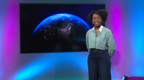 Emma-Louise on the Newsround set