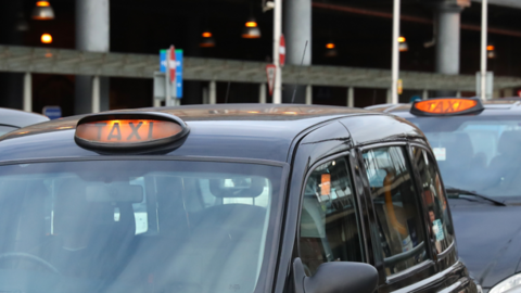 A generic shot of taxis in Greater Manchester
