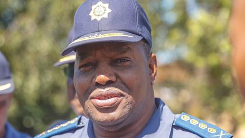 A head and shoulders image of Fannie Masemola in a police cap. His blue uniform's epaulets can be seen.