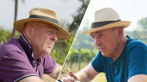Brian and Melvyn from Race Across the World looking at each other.
