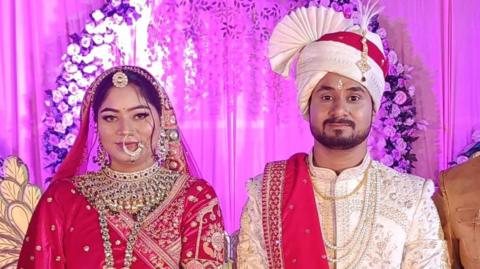 Sonam and Raja Raghuvanshi pictured in traditional Indian attire at their wedding