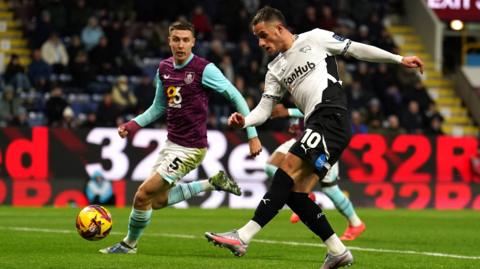 Derby County's Jerry Yates sees an effort saved by James Trafford