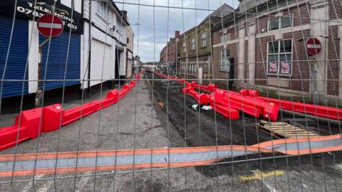 High street lined with construction works 