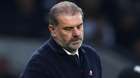 Tottenham manager Ange Postecoglou looks dejected during their defeat by Ipswich