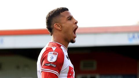 Stevenage's Chem Campbell celebrating