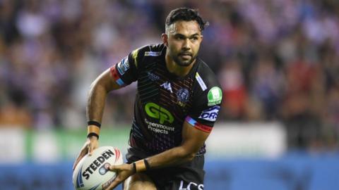 Bevan French of Wigan Warriors with the ball during a Betfred Super League match