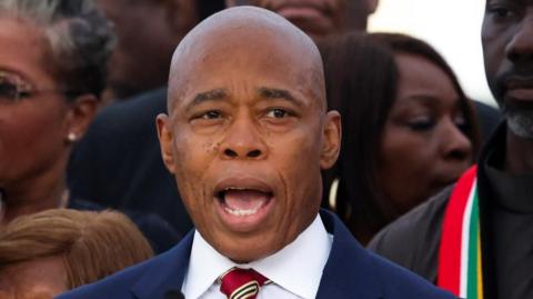 New York City Mayor Eric Adams speaks to the press outside his official residence Gracie Mansion