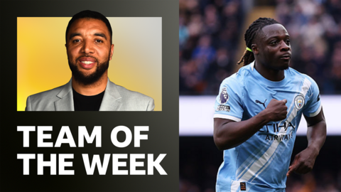 Troy TOTW graphic/Doku celebrates scoring for Man City