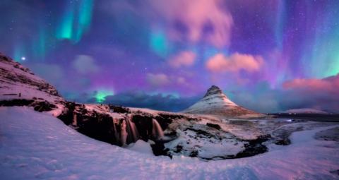 Spectacular Northern Lights over Kirkjufell Mountain Snæfellsnes peninsula, near the town of Grundarfjörður Iceland.