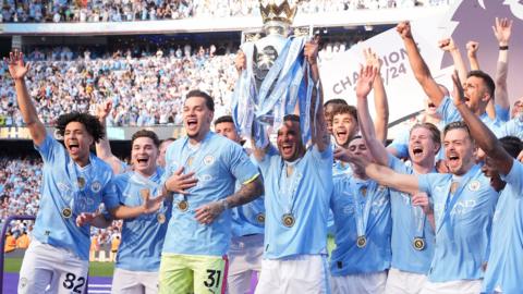 Man City players celebrate