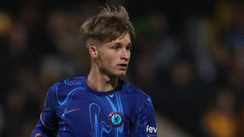 Jimmy-Jay Morgan in action for Chelsea's under-21 side. He is looking to his left in anticipation of getting the ball