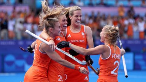 Netherlands celebrate a goal in the women's hockey semi-final v Argentina