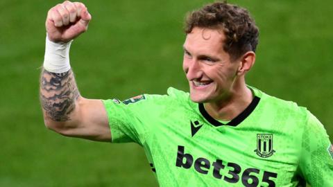 Jack Bonham of Stoke City celebrates victory in the penalty shootout