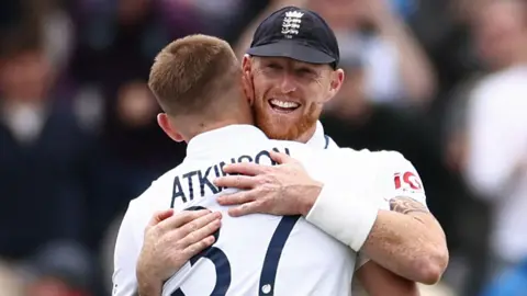 England's Gus Atkinson embraces captain Ben Stokes after the hosts seal victory over New Zealand at Lord's