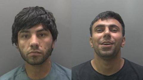 Custody image of Torgalai Estoman (left) with a straight face, wearing a grey T-Shirt and Gulzaman Safizada wearing a black T-shirt - laughing