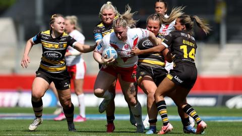 Vicky Whitfield of St.Helens is tackled