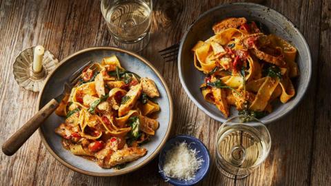 Two bowls of 'Marry Me' chicken pasta.