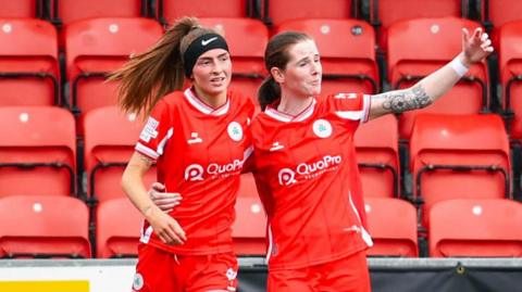 The McGuinness sisters celebrate their goal