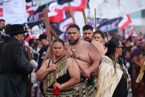  Hikoi members leave Waitangi Park and walk along the streets heading towards Parliament on November 19, 2024 in Wellington, New Zealand.