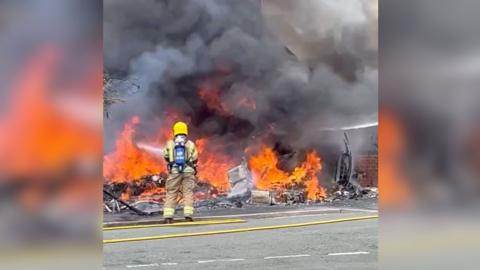 Firefighters extinguishing a fire