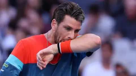 Cameron Norrie celebrates