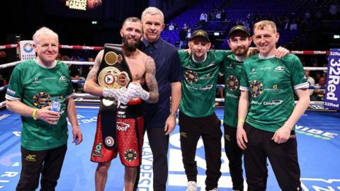 Anthony Cacace with coaches Michael Hawkins Sr and Jr, Barry O'Neill, Ruairi Dalton and manager Simon Legg