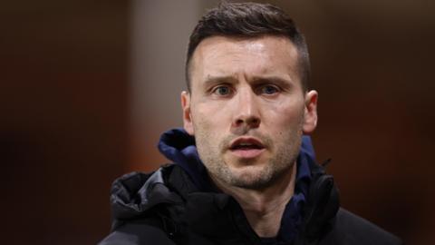 Mat Sadler on the touchline