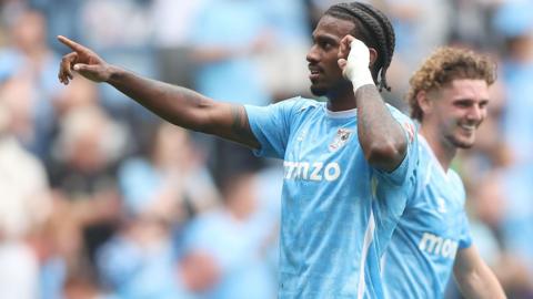 Haji Wright celebrates scoring for Coventry against QPR 