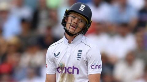 England captain Ollie Pope looks frustrated after being dismissed