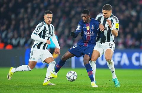 Ousmane Dembele battles with Malick Thiaw and Jacob Ramsey for the ball during Paris St-Germain's game against Newcastle United at the Parc des Princes on 28 January, 2026