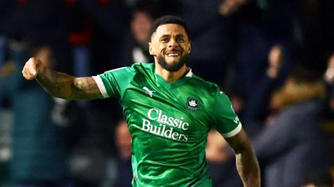 Andre Gray celebrates scoring for Plymouth Argyle